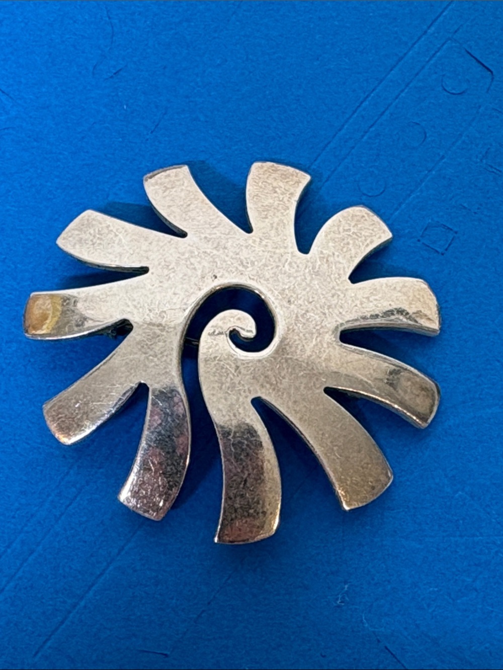 Sterling silver sunburst pin